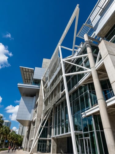 Low-angle architectural shot of a modern steel and concrete structure in Tampa, bright Florida daylight, deep blue sky, crisp lines.
