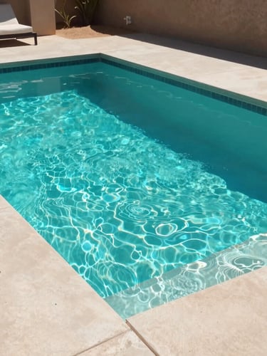 Vivid turquoise swimming pool in a modern Scottsdale backyard, clean concrete decking, warm desert sunlight, sharp focus, 35mm