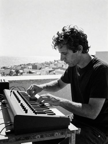 Stark documentary photography of an artist in deep concentration adjusting wires on a modular synthesizer, harsh Mediterranean midday sun casting deep shadows, 35mm film grain