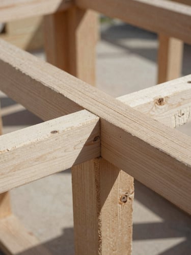 Close-up of a complex timber frame joint in progress, natural directional daylight emphasizing texture and form, desaturated earth tones, sharp focus, medium format film
