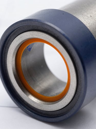 Precise CAD cross-section of a high-performance mechanical seal face, showing finite element analysis stress concentrations in safety orange and deep blue, sharp technical drafting lines, crisp laboratory daylight.