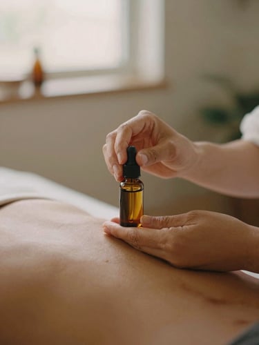 Close-up of therapist hands preparing organic massage oil in a warm, sand-toned San Diego studio, shallow depth of field, 35mm film