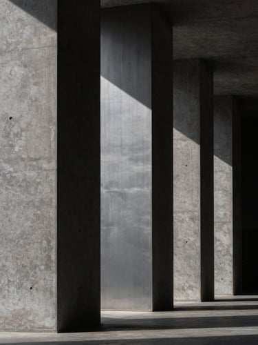 Abstract architectural geometry, dramatic side-lighting on dark concrete and brushed steel columns, sharp shadows, minimalist composition.