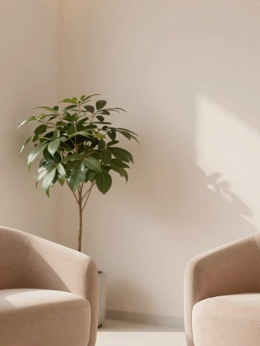 Minimalist boutique dental clinic interior, soft natural light, warm pastel tones, elegant clean design, comfortable modern armchair, indoor plant
