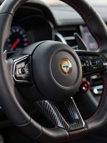 Extreme close-up of a clean modern German sports car steering wheel, high-contrast studio lighting, leather and carbon fiber textures, shallow depth of field.