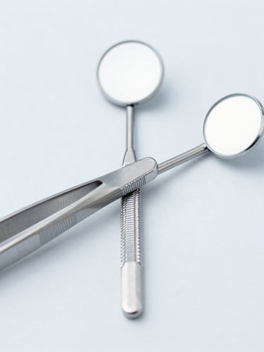 Macro clinical flat-lay of sterile stainless steel dental tweezers and mirrors on a pristine light gray background, bright high-key studio lighting, sharp focus.