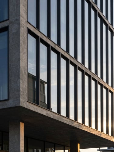 Minimalist modern concrete and glass financial building in Geneva, strong diagonal shadow lines, soft morning window light, high-end architectural editorial photography, 35mm