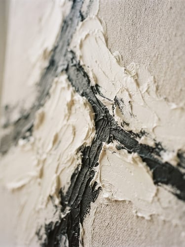 Close-up detail shot of a minimalist abstract canvas painting, thick textured brushstrokes in warm white and charcoal, soft side lighting from a window, shallow depth of field