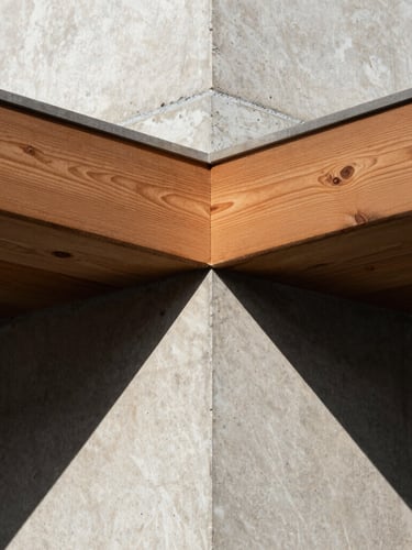 Extreme close-up architectural photograph of a flawless concrete joint and cedar timber connection, high-contrast late afternoon sunlight casting sharp geometric shadows, rich material textures.