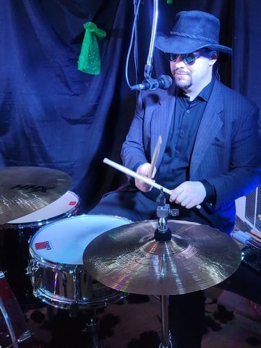 ShanWow! playing drums.