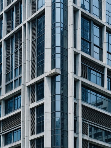 A close-up of architectural concrete and glass lines of Two Exchange Square in Hong Kong, bright natural daylight, cool slate tones, sharp focus, 35mm
