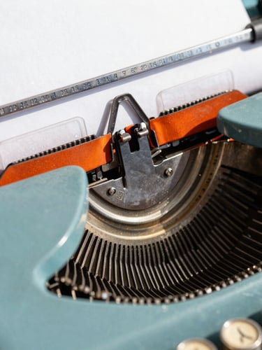 A tight macro shot of a vintage typewriter key striking crisp white paper, bright high-key daylight, sharp graphic orange shadows, 35mm photography.