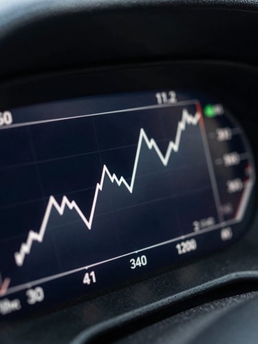 Ultra-wide macro close-up of a clean, high-contrast digital dashboard displaying upward organic traffic trendlines on a dark device screen, sharp studio shadows, cool-toned daylight.