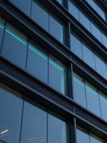 Macro low-key corporate architectural perspective, sleek steel and glass structure at dusk, cool blue and neon teal ambient glows, sharp focus, 35mm