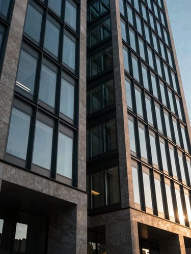 Low-angle cinematic architectural shot of a modern glass and concrete financial building in Budapest, dramatic golden-hour window light reflecting off sharp steel structures, 35mm lens