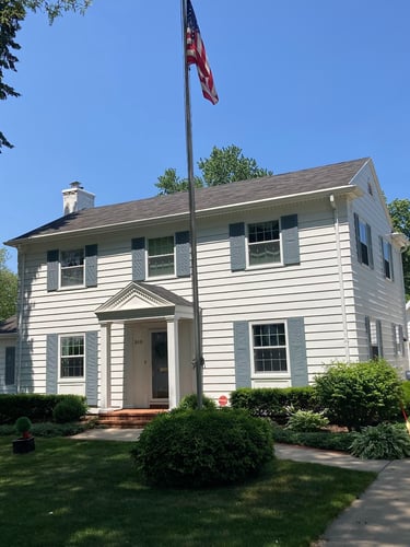 Peak Pro Wash soft washing house siding in Green Bay WI