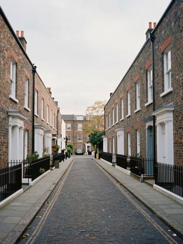 Symmetrical wide view of a classic British brick terrace street, clean pavements, soft diffuse natural UK light, architectural perspective.