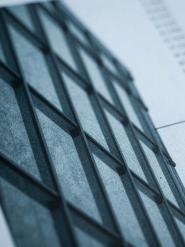 Close-up of a printed financial report with sharp architectural shadows, cool overcast daylight, 35mm