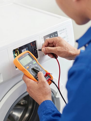 Close-up of a technician's hands in blue uniform testing a washing machine control board with a multimeter, bright clean daylight, sharp focus on tools