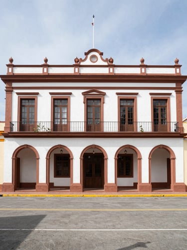 Wide environmental shot of the historic Yauco municipal building facade under bright natural daylight, crisp documentary photography.