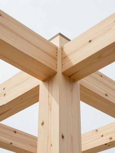 Close-up of a massive cross-laminated mass timber structural column, showing the clean engineered wood grain and precise joint connections under bright daylight.