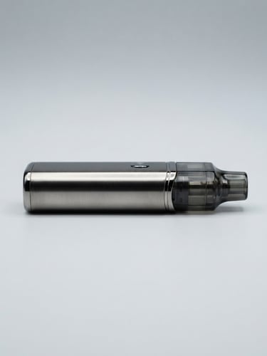 Sleek metallic vape device on a crisp minimalist light gray background, macro lens, sharp studio lighting, clean reflections