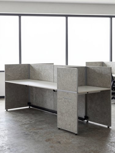 Environmental shot of a clean modular open-plan workstation in a CDMX office, overexposed north-facing window light, four connected desk modules with integrated cable management channels visible underneath, no people, concrete and steel aesthetic, wide-angle perspective showing the modular joint detail
