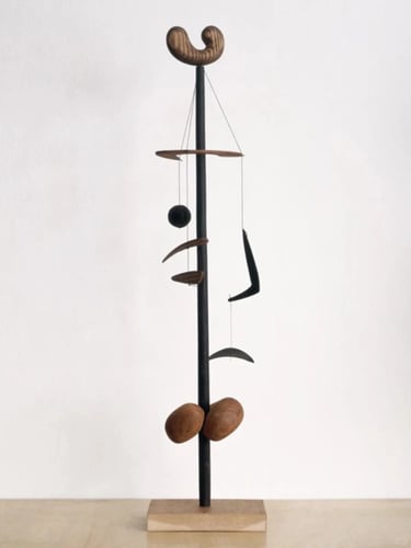Standing abstract sculpture with balanced organic shapes, reflecting Isamu Noguchi’s sculptural desi