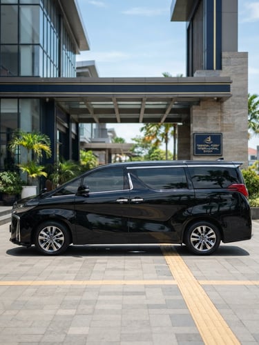 Side profile of a pristine black Toyota Alphard parked in front of a modern luxury terminal in Batam, bright natural daylight, clean reflections