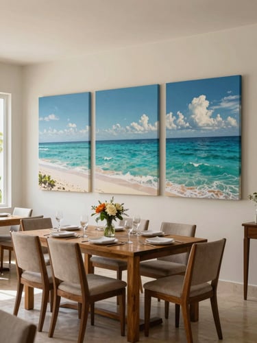 Wide environmental shot of a Cancún dining room, a curated triptych of ocean-toned canvases dominating the wall behind a wooden table set for dinner, soft natural window light entering from the left, the room fully inhabited—a vase of flowers on the table, chairs pulled in