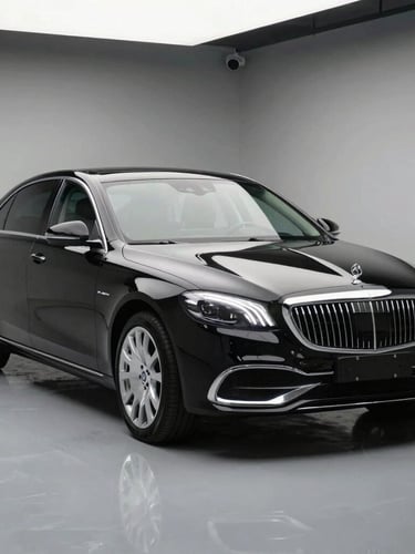 A pristine black luxury sedan parked in a clean modern garage, sharp reflections on the glossy paint, 3/4 front angle, professional studio lighting, portrait aspect ratio.