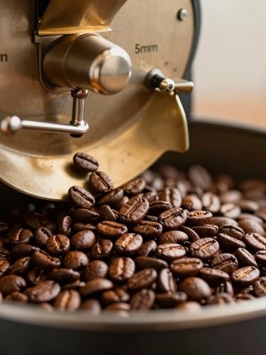 Close-up of roasted coffee beans spilling from a professional roaster, rich brown textures, warm golden lighting, 35mm