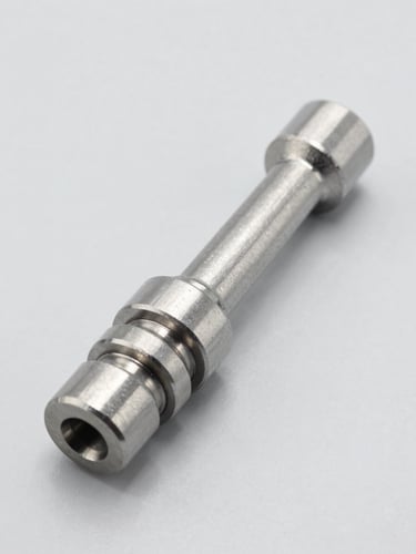 Crisp studio shot of a high-performance steel ball joint and steering tie rod, clean light gray background, bright even lighting highlighting technical details