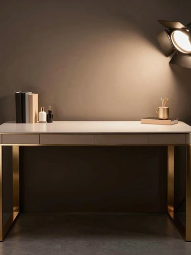 Sleek high-end workspace setup with dramatic low-key studio lighting, warm champagne-gold accents on metallic hardware, deep shadows, 35mm