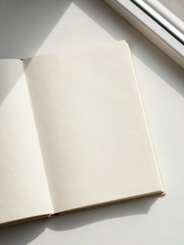 Overhead flat-lay of a physical book resting on textured cream paper, soft natural window light, gentle shadows, minimalist editorial photography