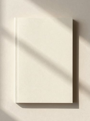 Minimalist editorial photography of a physical book cover resting on textured creamy paper, soft natural window light, gentle shadows, overhead flat-lay composition, 35mm lens