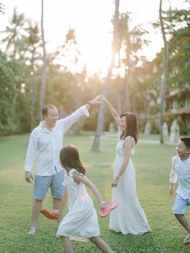 candid family moment at Westin Bali with warm sunset light