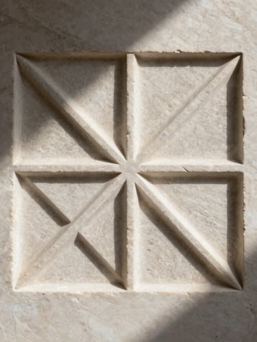 Dramatic close-up of a physical chisel carving deep geometric patterns into a light travertine wall, sharp raking light casting long shadows across the textured grooves.