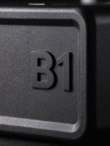 Extreme close-up of the physical B1 Node matte casing, sharp technical lines, stark studio lighting with dramatic shadows, orthographic perspective.