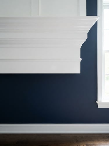 Sharp, clean paint line where deep navy wall meets crisp white crown molding, high-contrast architectural detail