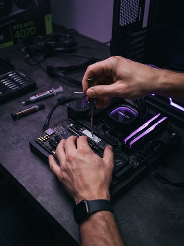 Close-up of Théo Chevalier's hands expertly assembling a custom PC, components neatly arranged on a dark workbench, subtle violet ambient lighting, macro depth of field.