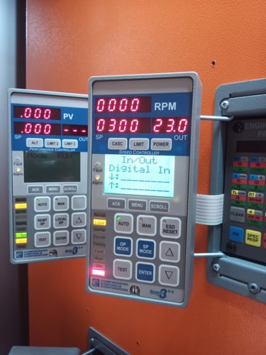 Industrial digital speed controller display panel showing RPM and digital in status.