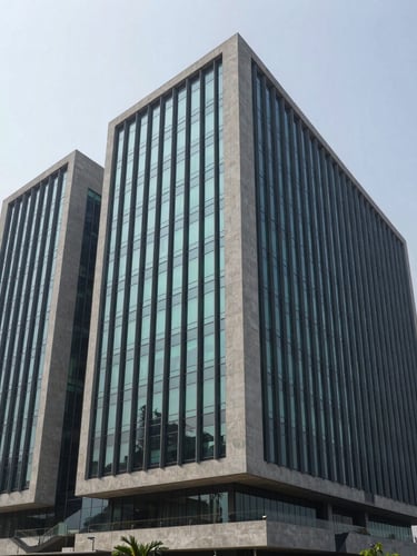 Wide architectural angle of a modern minimalist concrete and glass corporate headquarters in Delhi NCR, cool overcast daylight, sharp shadows, 35mm