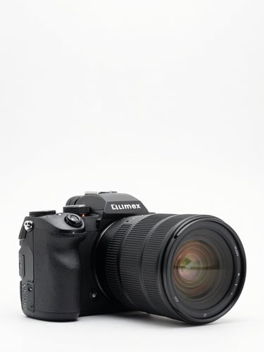 Front profile of a professional mirrorless camera body, clean white studio backdrop, bright high-key lighting, sharp details