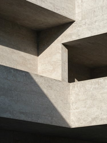 Abstract close-up of sharp architectural concrete lines, high-contrast geometric shadows, serene minimalist daylight.