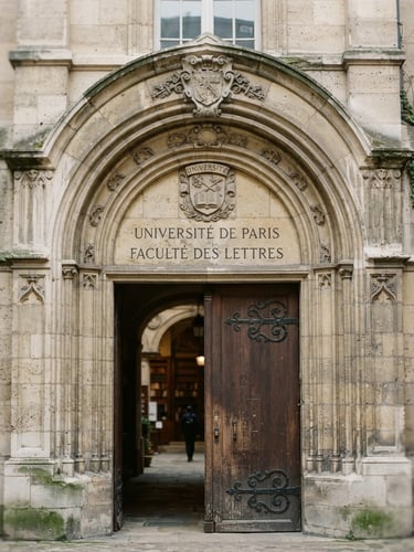 Dignified architectural detail of a classic Parisian university stone archway, soft natural afternoon daylight, shallow depth of field, 35mm film.