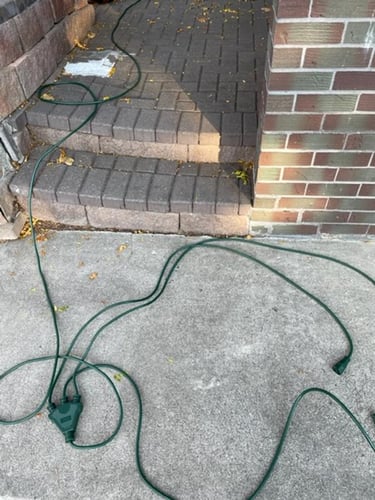 extension cords outside causing trip hazards