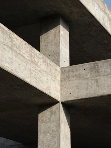 Macro shot of a modern industrial concrete structure with sharp geometric lines, harsh natural sunlight casting deep shadows, 35mm