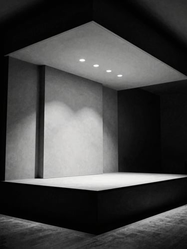 Low-angle architectural lines of a modern press room, empty podium under sharp spotlighting, high-contrast chiaroscuro, deep charcoal tones.