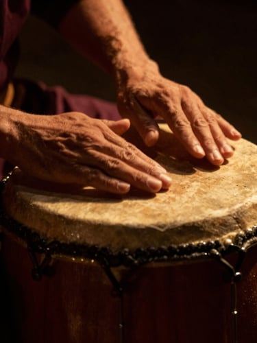 Dramatic cinematic close-up of hands striking a traditional wooden Duff drum, low-key warm stage lighting, deep shadows, gold dust catching the light, shallow depth of field